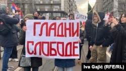 Protesters blocking the road in front of a law faculty in downtown Belgrade