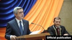 Armenia - President Serzh Sarkisian (L) speaks at the inauguration of Yerevan's new Mayor Taron Markarian (R), 18Nov2011.