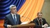 Armenia - President Serzh Sarkisian (L) speaks at the inauguration of Yerevan's new Mayor Taron Markarian (R), 18Nov2011.