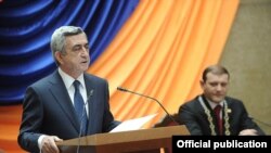 Armenia - President Serzh Sarkisian (L) speaks at the inauguration of Yerevan's new Mayor Taron Markarian (R), 18Nov2011.