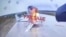 A Russian military aircraft is seen burning on video footage from a Ukrainian drone attacking the Belaya air base, near Russia's border with Mongolia.