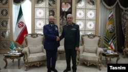 Fayyad Al-Ruwaili, general chief of staff of Saudi Arabia’s armed forces, meets his Iranian counterpart, Mohammad Baqeri, in Tehran on November 10.