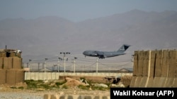 AFGHANISTAN -- A U.S. Air Force transport plane lands at the Bagram Air Base in Bagram, July 1, 2021