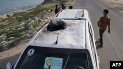 Гуманитардык уюмдун кызматкерлери бараткан автоунаага абадан сокку урулган. 2-апрель, 2024-жыл. Дейр-эль-Балах шаары. Газа тилкеси.