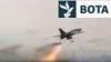This grab taken from a video relesed by Iran's state broadcaster (IRIB) on April 6, 2026, show what it says are drones launched at US targets at Saudi Arabia's Al-Kharj base and Kuwait's Al-Adiri base.