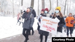 Women march in Bishkek calling for an end to violence against women on December 12.