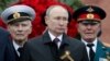 Russian President Vladimir Putin takes part in a commemoration ceremony in Moscow on May 9.