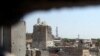 A destroyed minaret at the Grand Al-Nuri Mosque is pictured through a hole at an Iraqi-held position in the Old City in Mosul on June 27.