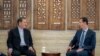 Syrian President Bashar Assad (R) meets with Iranian First Vice-President Eshaq Jahangiri in Damascus, January 29, 2019