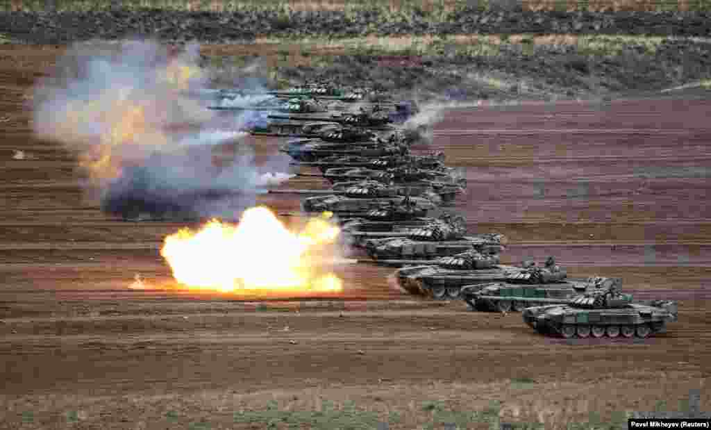 T-72B tanks fire during military exercises at a training ground in Kazakhstan's Almaty Region. (Reuters/Pavel Mikheyev)