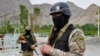 Kyrgyz soldiers guard a water supply facility outside the village of Kok-Tash near the Kyrgyz-Tajik border.