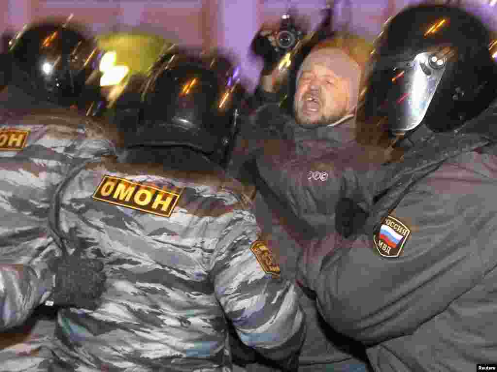Police detain a man during a protest rally to defend Article 31 of the Russian Constitution, which guarantees the right to freedom of assembly, in St. Petersburg on January 31. Photo by Aleksandr Demianchuk for Reuters