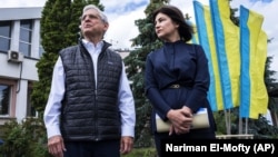 U.S. Attorney General Merrick Garland (left) and Ukrainian Prosecutor-General Iryna Venediktova, met near Lviv on June 21. 