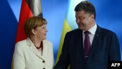 Анґела Меркель і Петро Порошенко 