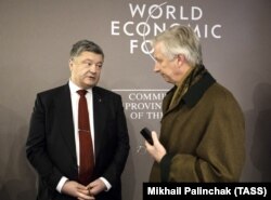 Poroșenko cu regele Philippe al Belgiei în Davos.
