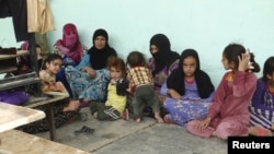 Рамади шаарынан Албу Фараджа аймагына качкан тургундар. 11-апрель, 2015-жыл. 