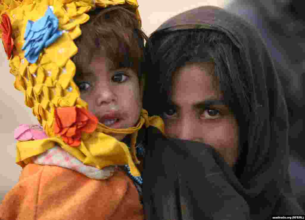 Two children at a UN camp. Photo by RFE/RL's Radio Free Afghanistan - NATO's leading civilian representative, Mark Sedwill, caused an uproar recently when he said children are safer in Kabul than they are the Scottish city of Glasgow. Click here to view photos of children living in the Afghan capital and see if you agree. 