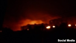 Пожежа в Маріуполі внаслідок обстрілу, пізній вечір 6 вересня 2014 року