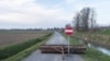 A stop sign is seen on a blocked road in San Fiorano, Italy