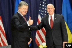 Ukrainian President Petro Poroshenko (left) met with U.S. Vice President Mike Pence at the Munich Security Conference