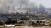 دخان معارك يتصاعد من كوباني السورية