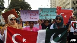 FILE: Pakistani students of the private PakTurk International Schools and Colleges hold placards during a protest in Karachi in November 2016.