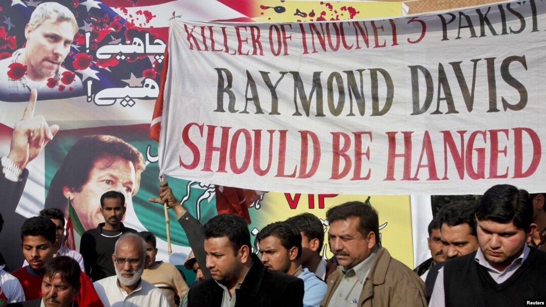 Supporters of the political party Tehreek-e Insaf take part in a protest against Raymond Davis in Lahore on February 17.