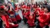 Participants of the Khamoro World Roma Festival dance through the historical center of Prague. (Reuters/David Cerny)