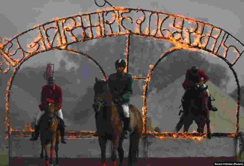 Nepalese soldiers demonstrate their skills during horse-racing festival in Kathmandu. (Reuters/Navesh Chitrakar)