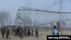 FILE: A damaged electricity pylon in Baghlan Province.