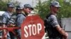 Police officers at a checkpoint near the border of the province of Ingushetia where a suicide bomber blew himself up (file photo)