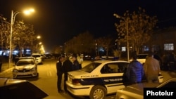 Armenia - Police cars are seen outside a kindergarten in Armavir where a man held a child hostage, 30Oct2017.