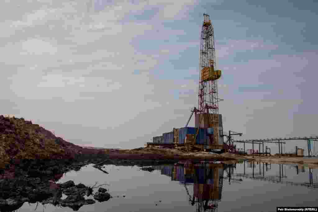 An abandoned oil well and waste from drilling near the herding grounds