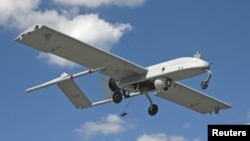 The drone strike appears to have targeted a vehicle (file photo)