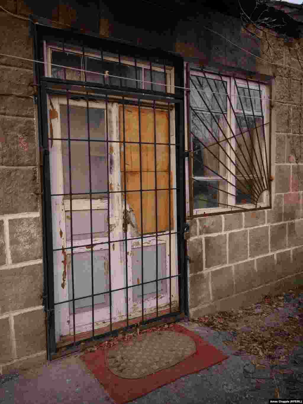 Permyakov is alleged to have entered an unlocked security gate and then smashed through this door to gain entry to the home. To get there he is believed to have wandered more than 4 kilometers in the early hours of January 12 in freezing temperatures, armed with an AK-74 assault rifle. On capture the 18-year-old reportedly claimed he was looking for &quot;a glass of water&quot; and started shooting inside the house after he was refused.