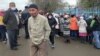 Драки за $95. Жители Казахстана штурмуют банки и почту, требуя обещанное властями пособие