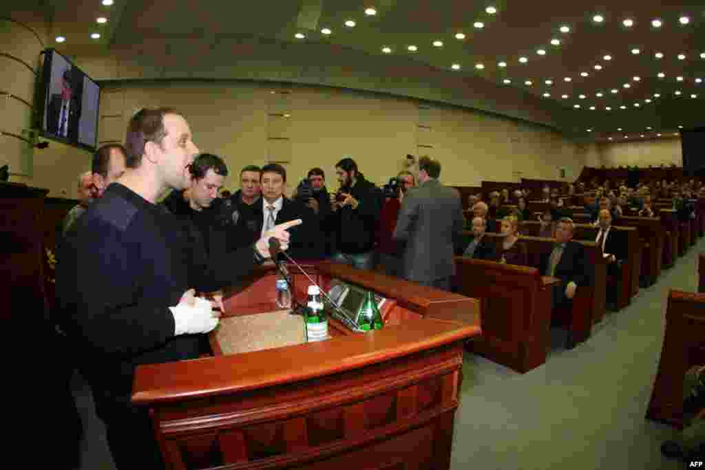 Leader of pro-Russian activists Pavel Gubarev shouts at deputies of the regional council after protesters broke into the hall during session in Donetsk on March 3. (AFP/Aleksandr Khudoteply)