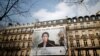 A banner with a giant portrait of jailed Iranian lawyer Nasrin Sotoudeh is seen on the headquarters of the French National Bar Council, demanding her release, in Paris, March 28, 2019