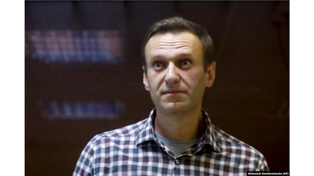 Russian opposition leader Aleksei Navalny stands in a cage in a Moscow court in February, before being sent to a notorious prison east of Moscow.