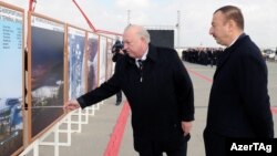 İlham Əliyev və Cahangir Əsgərov Heydər Əliyev Beynəlxalq Aeroportunda yeni aerovağzal kompleksinin təməlqoyma mərasimində - 17 mart 2011