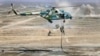 Troops disembark from a Chinese military helicopter during joint war games held in northwestern China in August 2021.