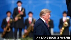 U.S. President Donald Trump arrives for a leaders' dinner during the NATO Summit in Brussels on July 1.