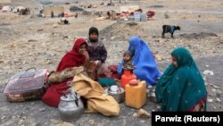 AFGHANISTAN -- Internally displaced Afghan family, who flee from recent conflict, take shelter at a desert in Khogyani district of Nangarhar province, November 28, 2017