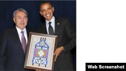 Kazakh President Nursultan Nazarbaev gives his U.S. counterpart Barack Obama the special gift in a frame. 