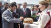 Belarus/Iran - Iranian President Mahmud Ahmadinejad is presented with a traditional Belarusian bread and salt upon his arrival in Minsk, 21May2007
