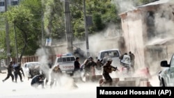 Security forces at the site of a suicide attack in Kabul on April 30.