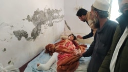 انځور له ارشیفه، بنو کې یوه ټپي شوې ماشومه