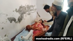 انځور له ارشیفه، بنو کې یوه ټپي شوې ماشومه