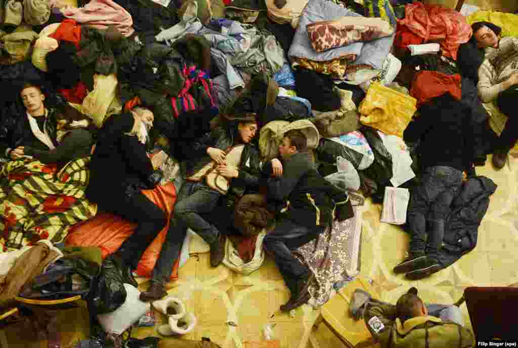 Occupying protesters sleep inside Kyiv&#39;s City Hall.