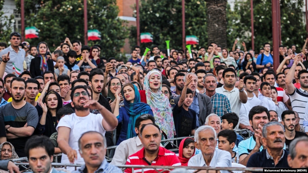 People gather in the city center of Rasht to watch the Iran-Morocco match on June 15.